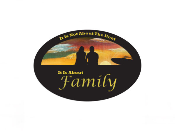 Oval-shaped sign with hand-painted sunset background and silhouette of a couple and a boat. Cutout text says "it is not about the boat, it is about family."