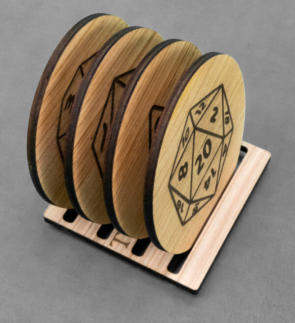 Set of 4 laser engraved wood coasters on a stand.