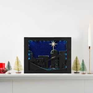 Beautiful 3d lightbox featuring a simple nativity scene with a glittery blue background reflecting the light throughout the scene. Lightbox is displayed on a mantle.