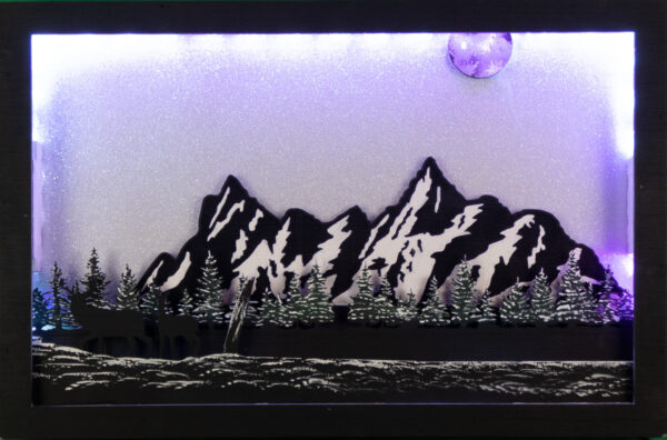 Beautiful 3d lightbox featuring a snowy mountain scene with a glittery white background reflecting the soft purple light through the scene.