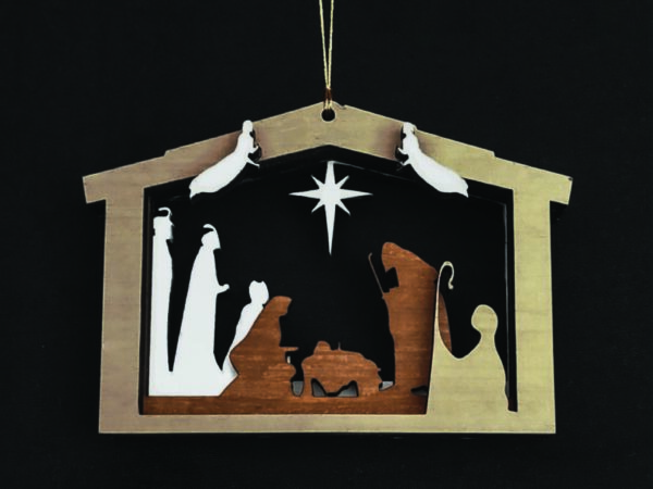 Layered 3D Nativity Christmas tree ornament, featuring the holy family in a stable, with wise men, shepherd, angels, and star. Black background.