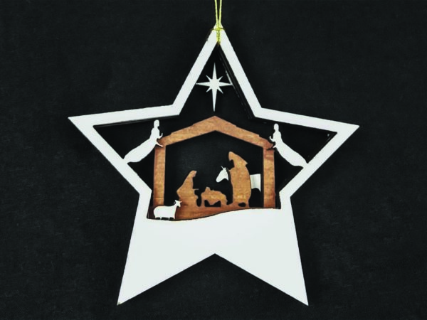 Star shaped, layered 3D Nativity Christmas tree ornament, featuring the holy family in a stable, with, angels, sheep, donkey and star. Black background.